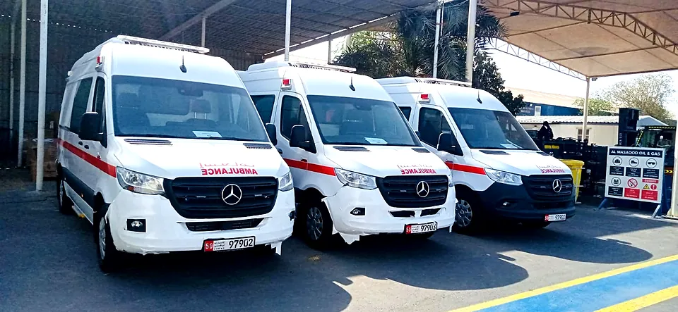 Fleet of branded ambulances with reflective livery in the UAE