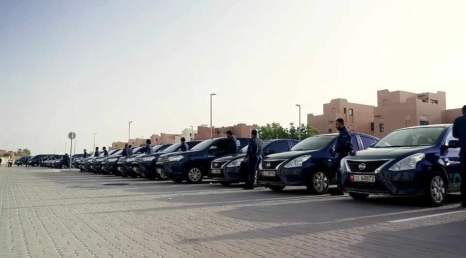 Long row of consistently branded fleet vehicles in the UAE