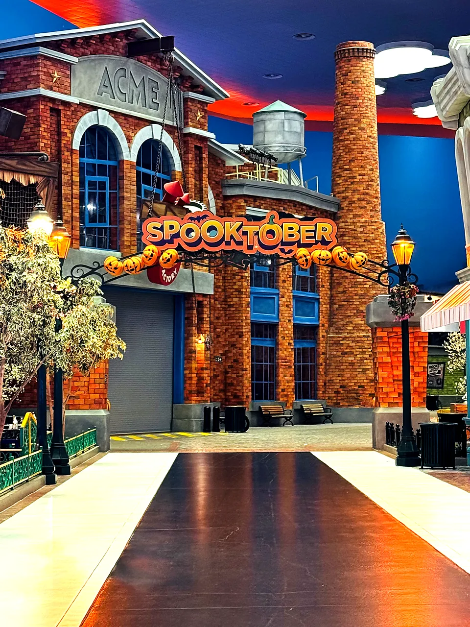Seasonal Halloween themed entrance with sculpted props at Warner Bros. World Abu Dhabi