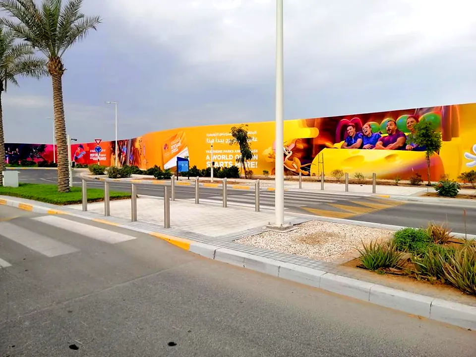 Colourful large format printed hoarding beside the road at Yas Island, Abu Dhabi